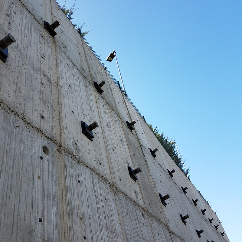 Geotechnical retaining wall anchors to prevent wall failure